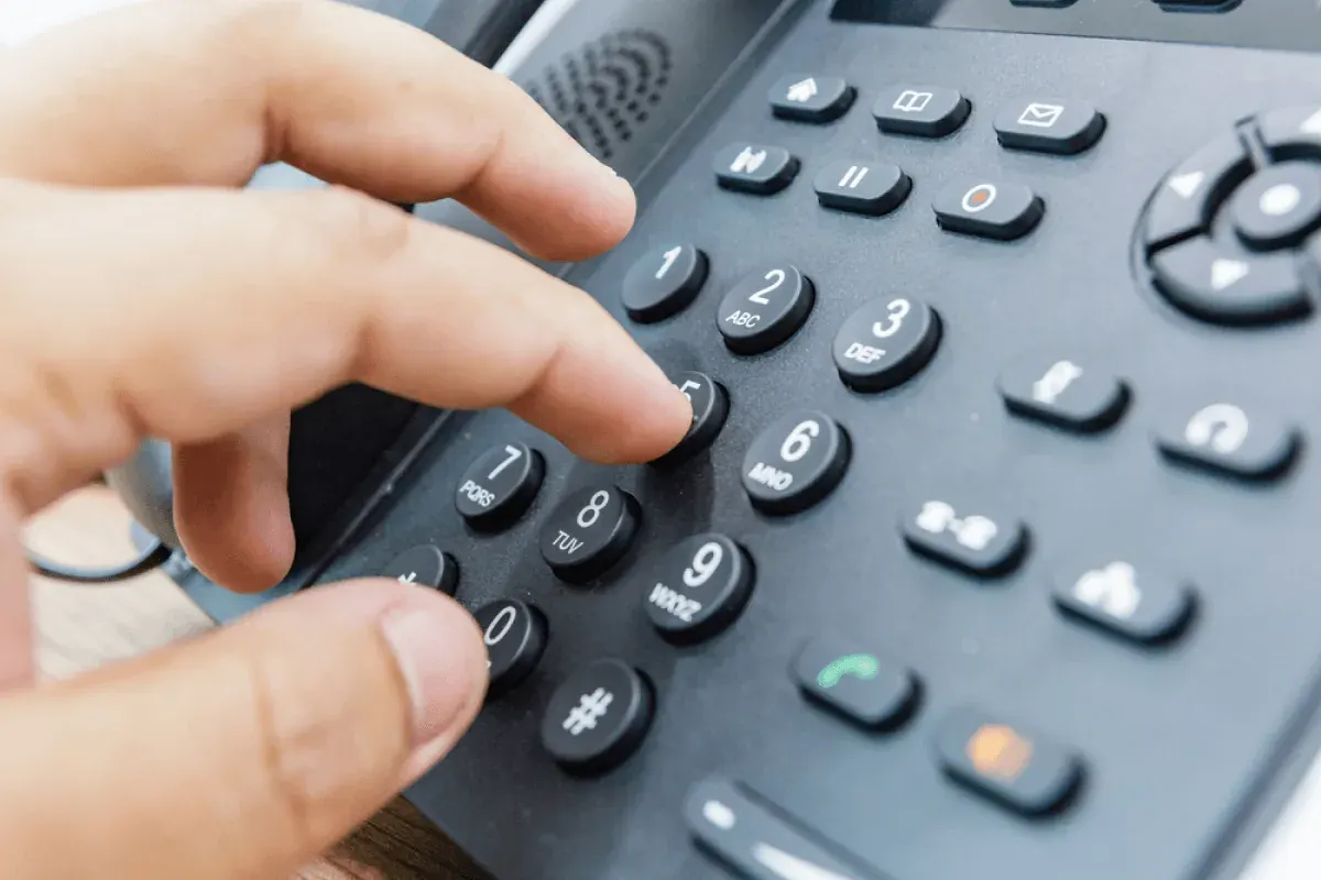 Hand dialing a desk phone keypad for outbound calling software